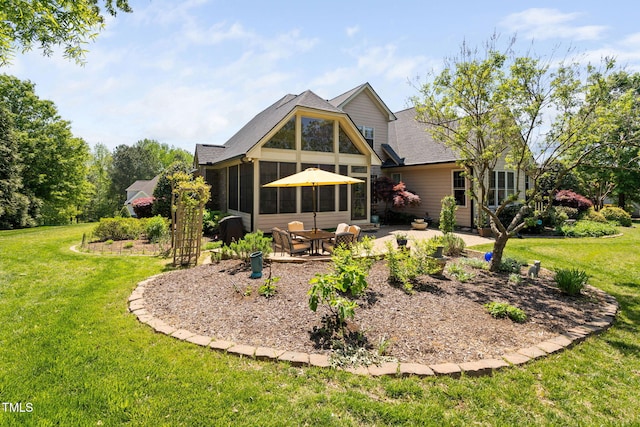 154 Sicily Dr, Clayton, NC 27527 - back of property featuring a patio area, a sunroom, a lawn, and roof with shingles