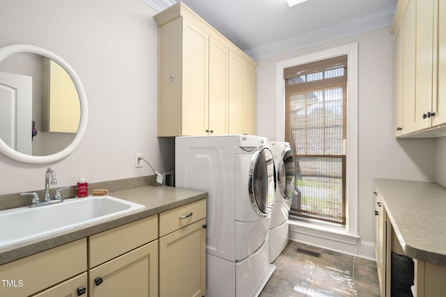 154 Sicily Dr, Clayton, NC 27527 - washroom with cabinet space, crown molding, and separate washer and dryer