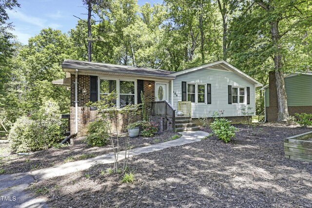 view of front of property with brick siding