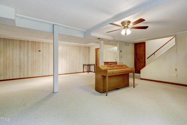 playroom featuring a ceiling fan, baseboards, and carpet