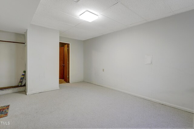 unfurnished bedroom featuring carpet floors and baseboards