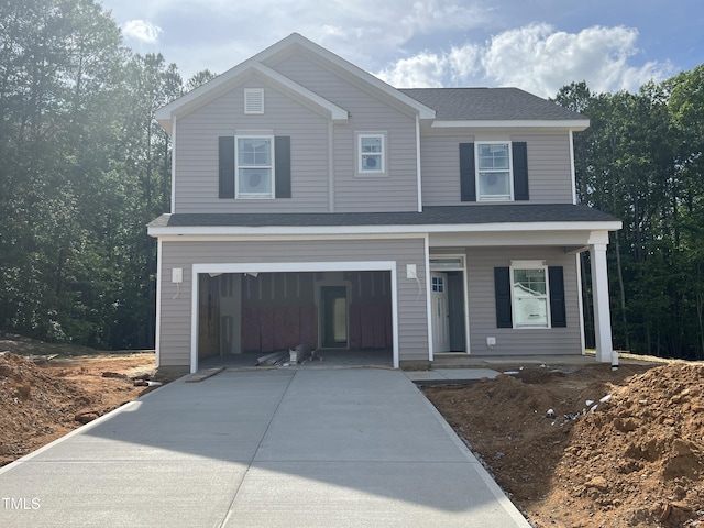 169 Pecan Valley Way, Four Oaks, NC 27524 - view of front of property with driveway, a porch, and a garage