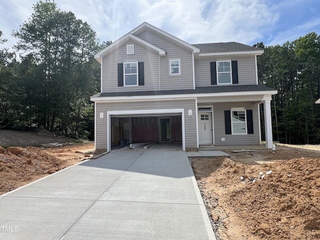 169 Pecan Valley Way, Four Oaks, NC 27524 - view of front of property featuring concrete driveway, an attached garage, covered porch, and a shingled roof