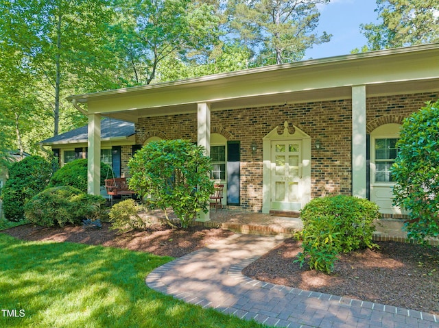 3420 Sheridan Dr, Durham, NC 27707 - entrance to property with brick siding and covered porch