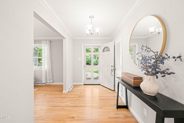 3420 Sheridan Dr, Durham, NC 27707 - entrance foyer featuring a chandelier, wood finished floors, ornamental molding, and baseboards