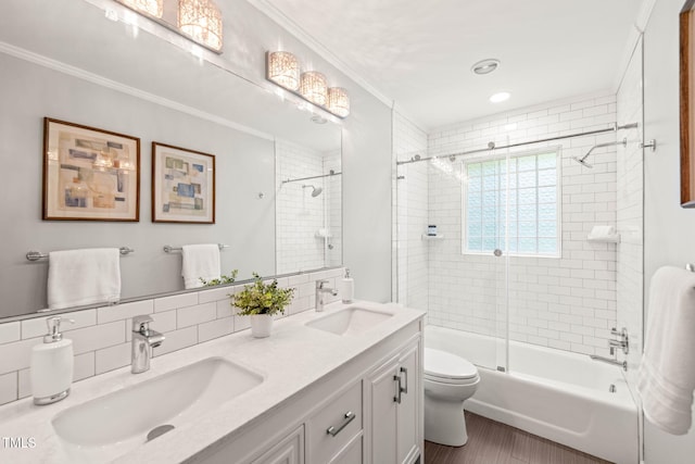 3420 Sheridan Dr, Durham, NC 27707 - full bath featuring toilet, ornamental molding, double vanity, and enclosed tub / shower combo