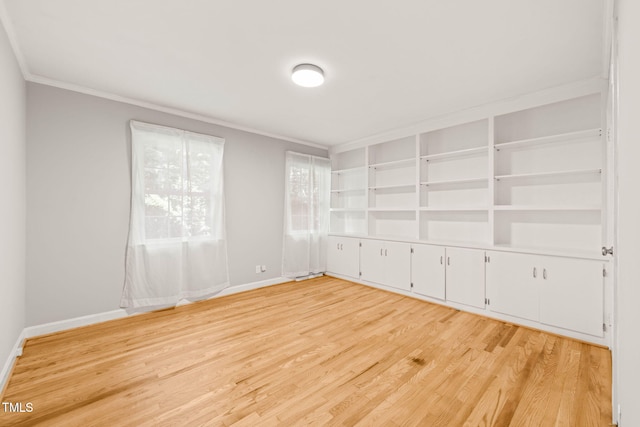 3420 Sheridan Dr, Durham, NC 27707 - empty room with ornamental molding, light wood-style floors, and baseboards