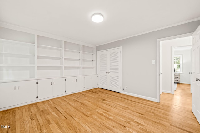 3420 Sheridan Dr, Durham, NC 27707 - empty room featuring ornamental molding, light wood-style floors, and baseboards