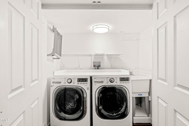 3420 Sheridan Dr, Durham, NC 27707 - washroom with washing machine and dryer