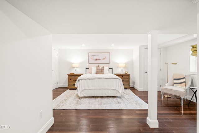 3420 Sheridan Dr, Durham, NC 27707 - bedroom featuring baseboards, wood-type flooring, and recessed lighting