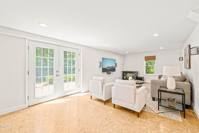 3420 Sheridan Dr, Durham, NC 27707 - living room featuring french doors, recessed lighting, and baseboards