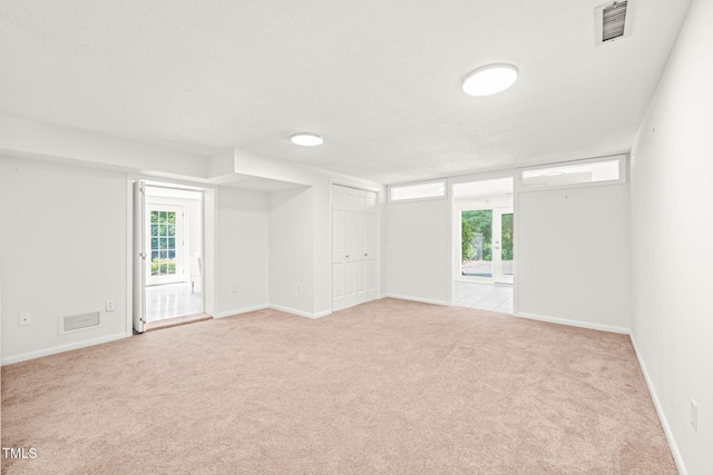 3420 Sheridan Dr, Durham, NC 27707 - empty room with carpet flooring, plenty of natural light, and baseboards