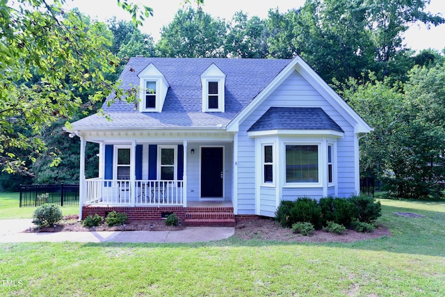 3832 Doeskin Dr, Apex, NC 27539 - view of front of house featuring covered porch and roof with shingles