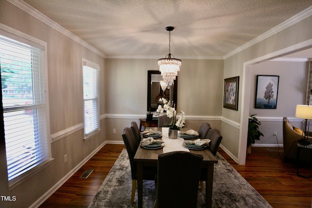 3832 Doeskin Dr, Apex, NC 27539 - dining area featuring healthy amount of natural light, dark wood-type flooring, a chandelier, a textured ceiling, and ornamental molding