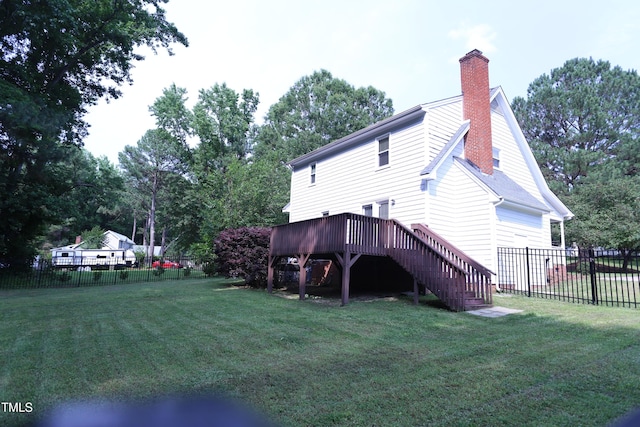 3832 Doeskin Dr, Apex, NC 27539 - back of house featuring stairway, a chimney, a wooden deck, and view of scattered trees