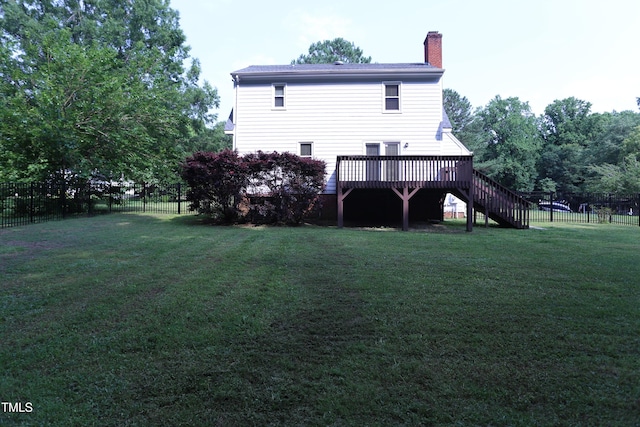3832 Doeskin Dr, Apex, NC 27539 - back of property featuring stairs, a wooden deck, and a chimney