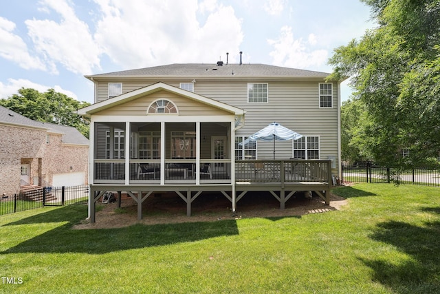 rear view of property with a sunroom, a fenced backyard, and a lawn