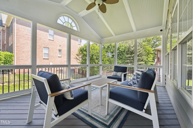 sunroom / solarium with ceiling fan and outdoor lounge area