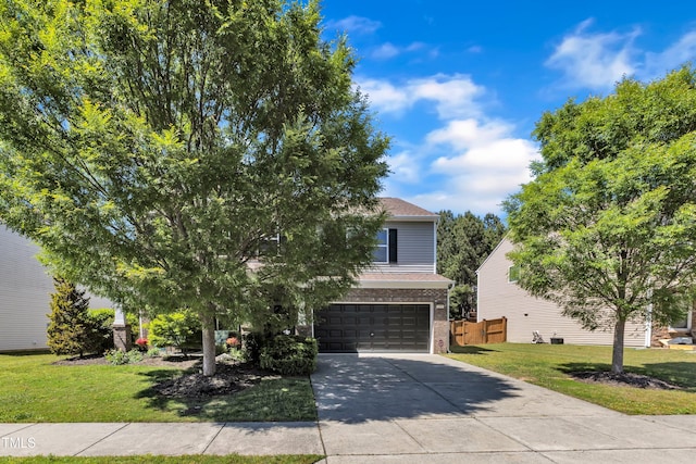 3801 Althorp Dr, Raleigh, NC 27616 - view of front of property with fence, an attached garage, a front lawn, brick siding, and driveway
