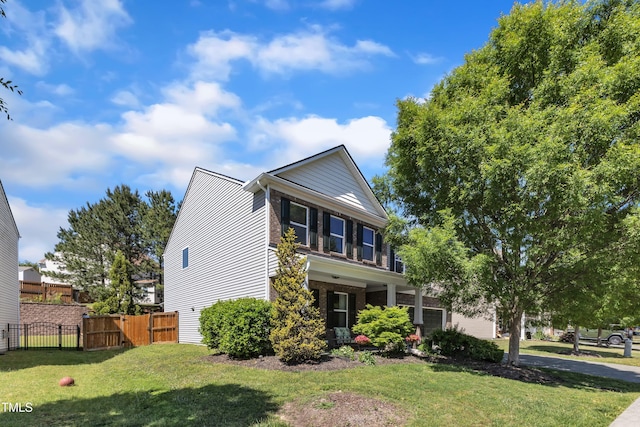 3801 Althorp Dr, Raleigh, NC 27616 - view of front of house featuring a garage, fence, a gate, and a front lawn