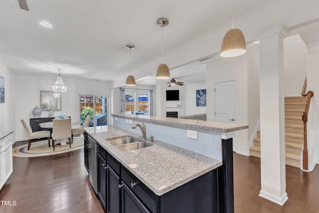 3801 Althorp Dr, Raleigh, NC 27616 - kitchen featuring a ceiling fan, visible vents, a sink, dark cabinetry, and dark wood-type flooring
