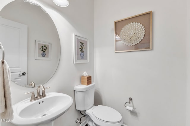 3801 Althorp Dr, Raleigh, NC 27616 - half bathroom featuring a sink and toilet