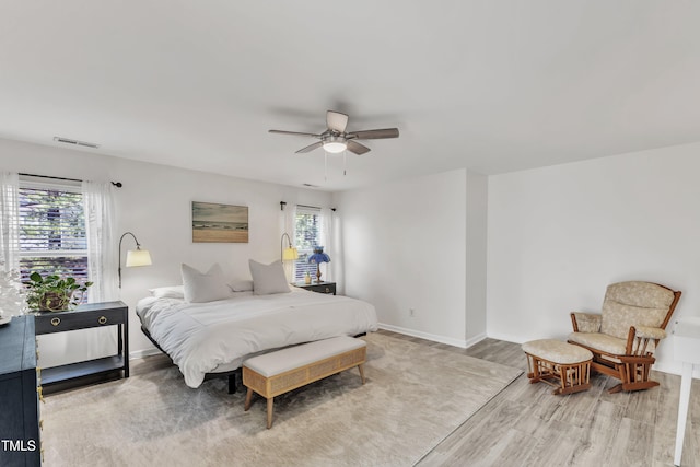 3801 Althorp Dr, Raleigh, NC 27616 - bedroom with baseboards, multiple windows, light wood-style flooring, and visible vents