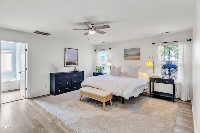 3801 Althorp Dr, Raleigh, NC 27616 - bedroom with visible vents, multiple windows, and light wood-type flooring