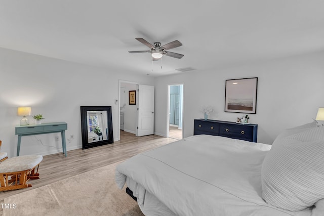 3801 Althorp Dr, Raleigh, NC 27616 - bedroom featuring a ceiling fan, visible vents, wood finished floors, baseboards, and ensuite bath