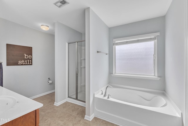 3801 Althorp Dr, Raleigh, NC 27616 - bathroom with visible vents, a bath, a shower stall, and vanity