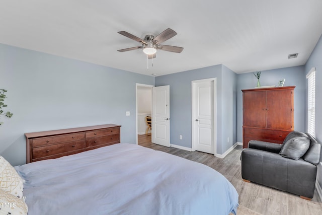 3801 Althorp Dr, Raleigh, NC 27616 - bedroom with baseboards, ceiling fan, wood finished floors, and visible vents