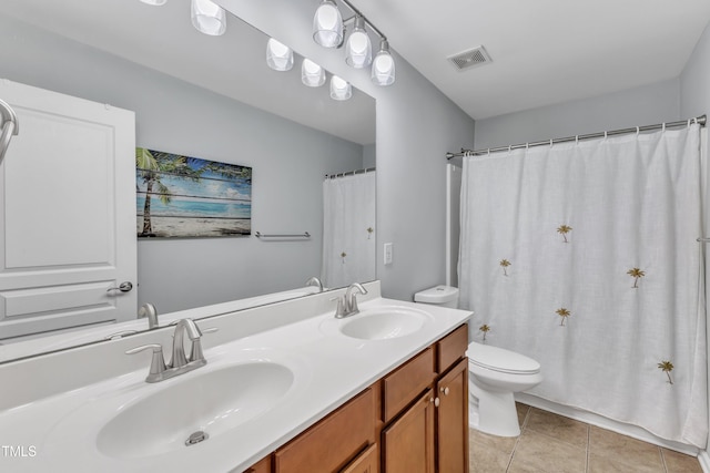 3801 Althorp Dr, Raleigh, NC 27616 - full bath featuring a sink, tile patterned flooring, toilet, and visible vents