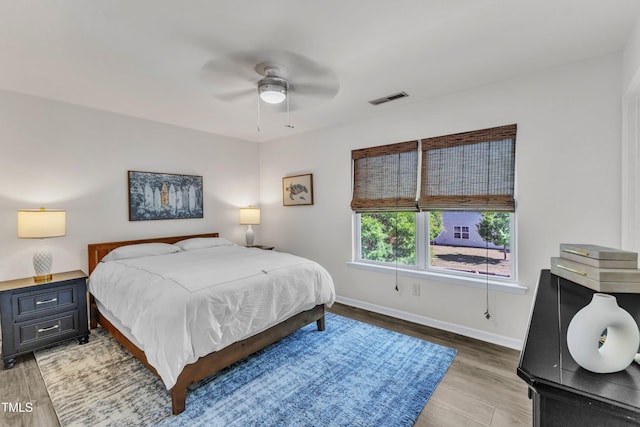 3801 Althorp Dr, Raleigh, NC 27616 - bedroom with visible vents, light wood finished floors, ceiling fan, and baseboards