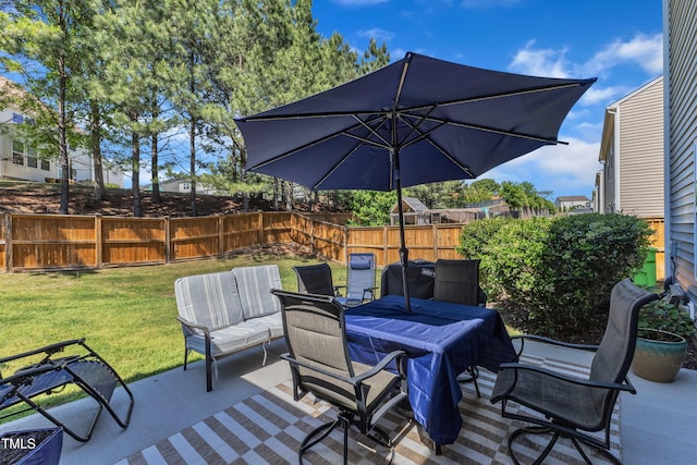 3801 Althorp Dr, Raleigh, NC 27616 - view of patio / terrace with outdoor dining area and a fenced backyard