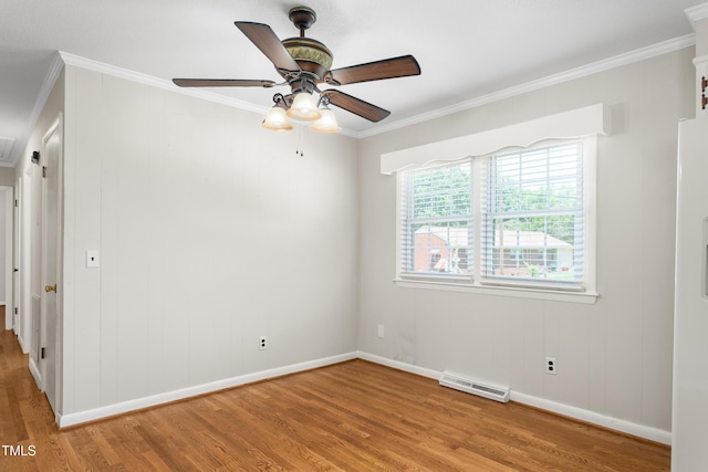 2917 Trail Six, Burlington, NC 27215 - unfurnished room with light wood-style floors, baseboards, crown molding, and a ceiling fan