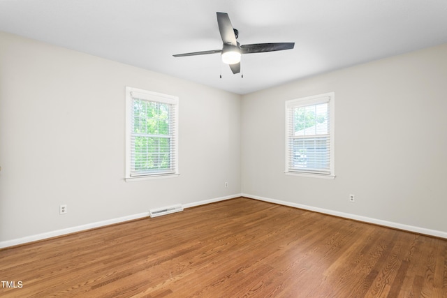 2917 Trail Six, Burlington, NC 27215 - unfurnished room featuring wood finished floors, baseboards, and ceiling fan