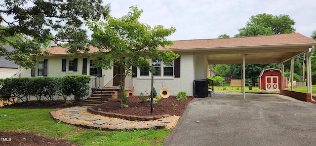 2917 Trail Six, Burlington, NC 27215 - ranch-style home featuring driveway, a carport, and brick siding