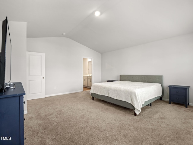6858 Keeneland Dr, Whitsett, NC 27377 - bedroom with baseboards, carpet, and vaulted ceiling