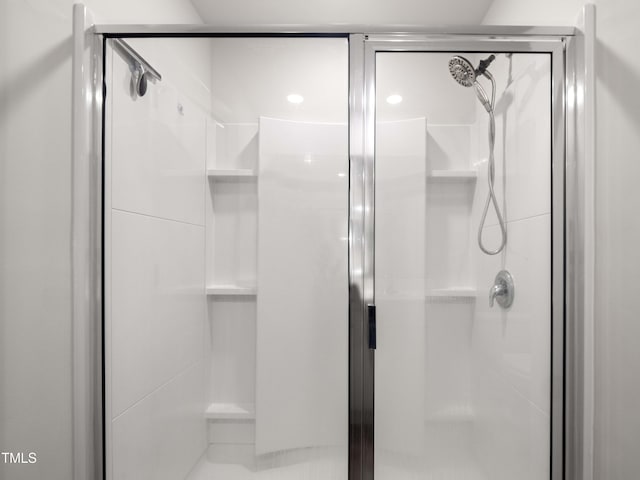 6858 Keeneland Dr, Whitsett, NC 27377 - bathroom with a shower stall