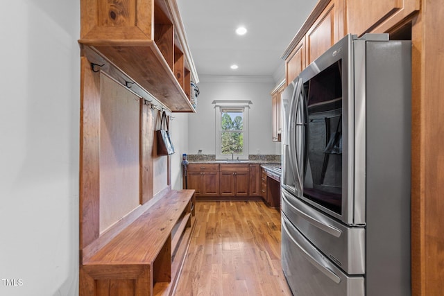 mudroom featuring crown molding, recessed lighting, and light wood finished floors