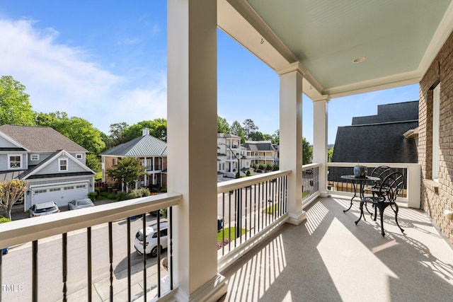 balcony featuring a residential view