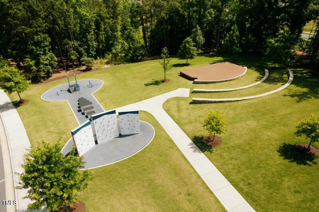 surrounding community with a yard
