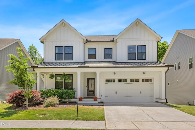 modern inspired farmhouse featuring a porch, board and batten siding, and a standing seam roof