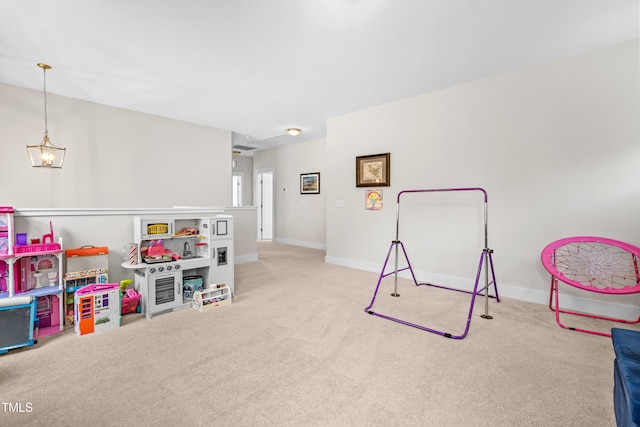 game room featuring baseboards and carpet flooring
