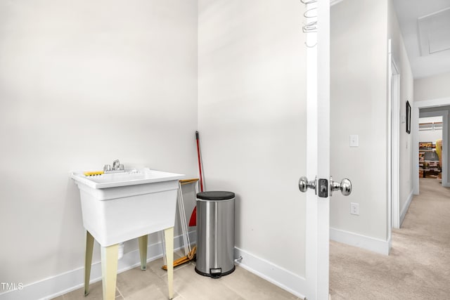 bathroom featuring baseboards