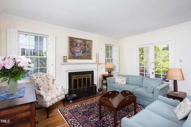 19 Oak Dr, Durham, NC 27707 - living room featuring ornamental molding, a fireplace with flush hearth, and wood finished floors