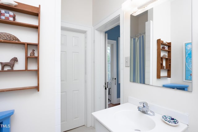 19 Oak Dr, Durham, NC 27707 - bathroom featuring vanity and curtained shower