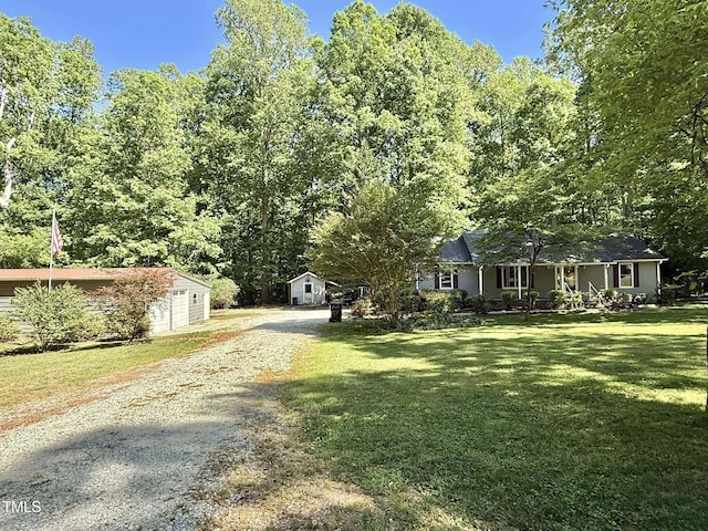 exterior space featuring gravel driveway