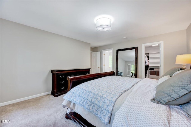 105 Wittenham Dr, Cary, NC 27519 - bedroom featuring light colored carpet, a spacious closet, baseboards, and a closet