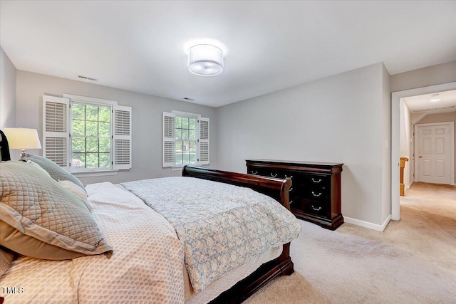 105 Wittenham Dr, Cary, NC 27519 - bedroom featuring light carpet and baseboards